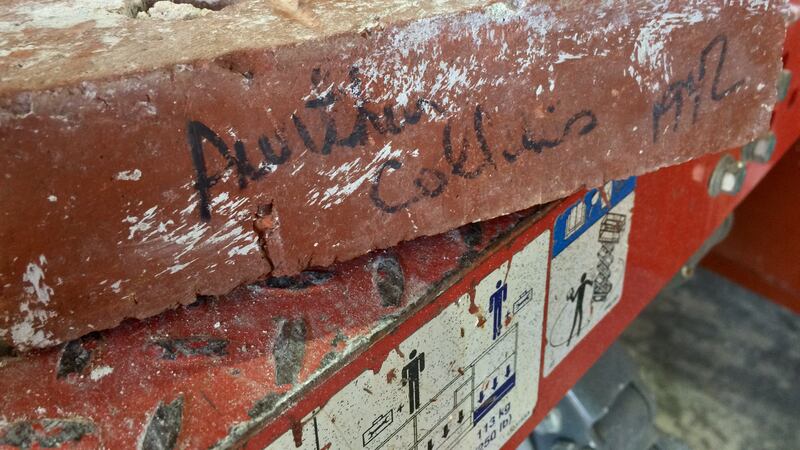 Brick signed by Arthur Collins in 1942, discovered in 2018